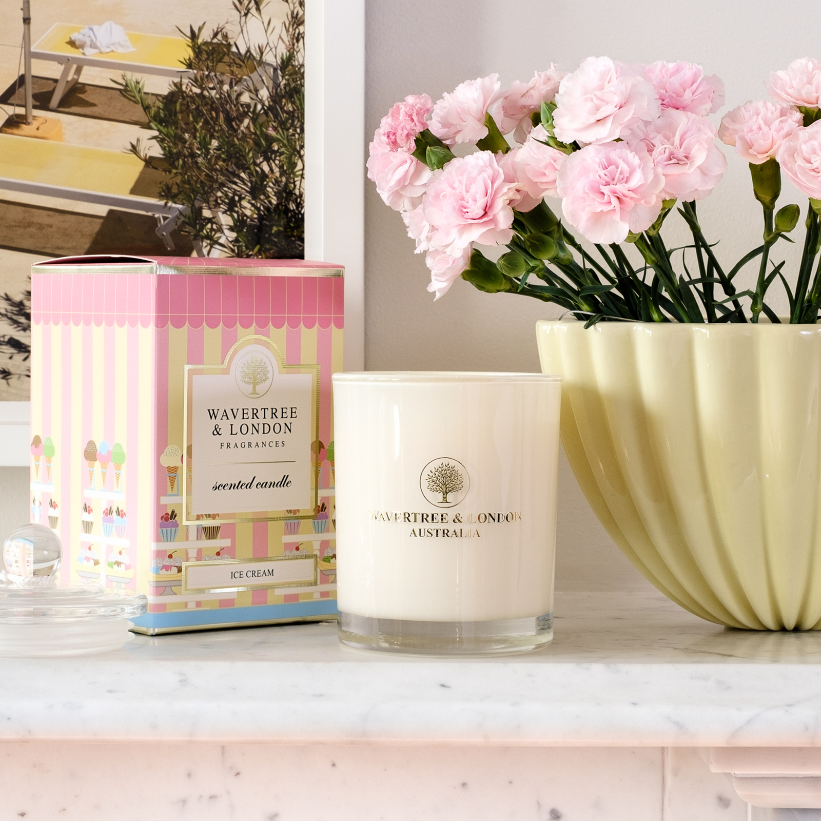 Wavertree & London ice cream scented candle styled with pink flowers on marble surface